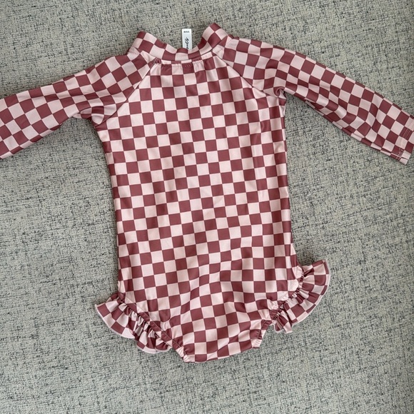 Kids Checkered Rashguard in Pink by Ruffle Butts - Picture 3 of 3